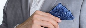 Poszetka, butonierka, fular, brustasza. Jak nosić marynarkę?